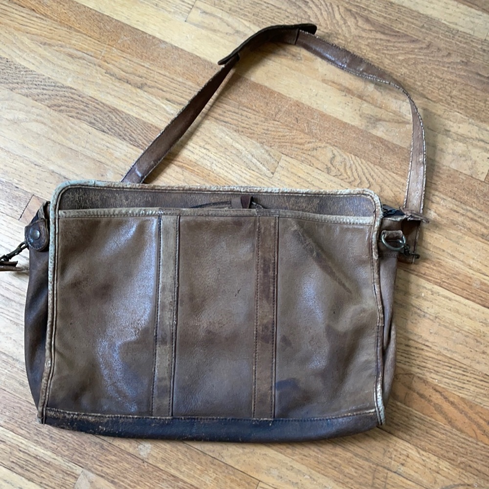 Vintage worn leather messenger bag